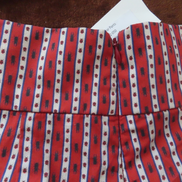 Never A Wallflower Women's rust Beetle stripe Print Flare Pants Size XS NWT $264 - Picture 6 of 8